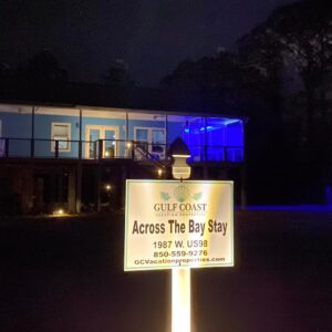 Photo of sign which reads "Across the Bay Stay"