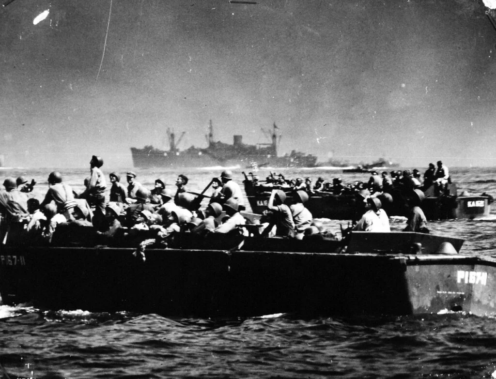 Men in an amphibious landing craft during WWII.