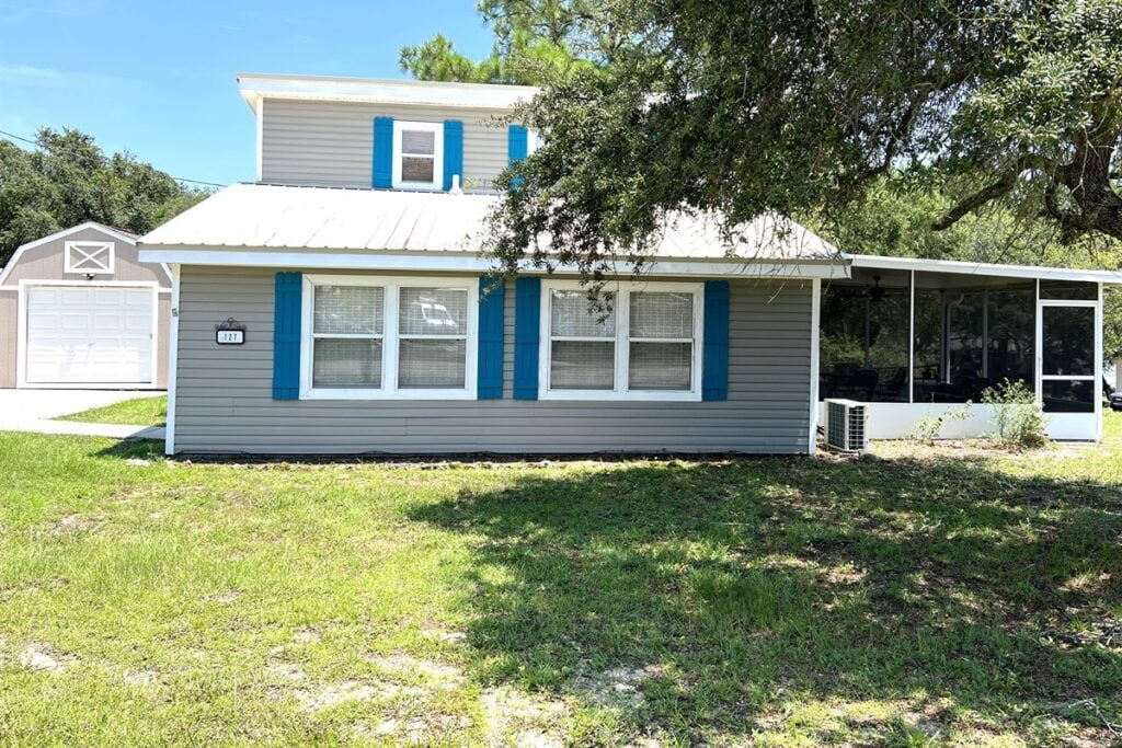 Front of a two story gray house